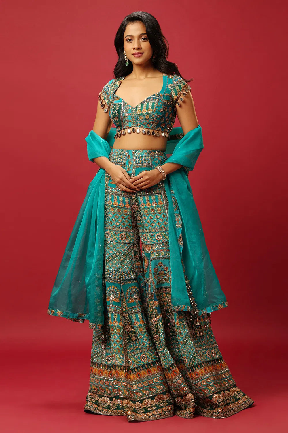 TURQUOISE BLUE SINGLE TIERED SHARARA PANT SET WITH AN ALL OVER MULTI COLOURED PRINT PAIRED WITH A MATCHING DUPATTA AND ZARI AND SEQUIN DETAILS